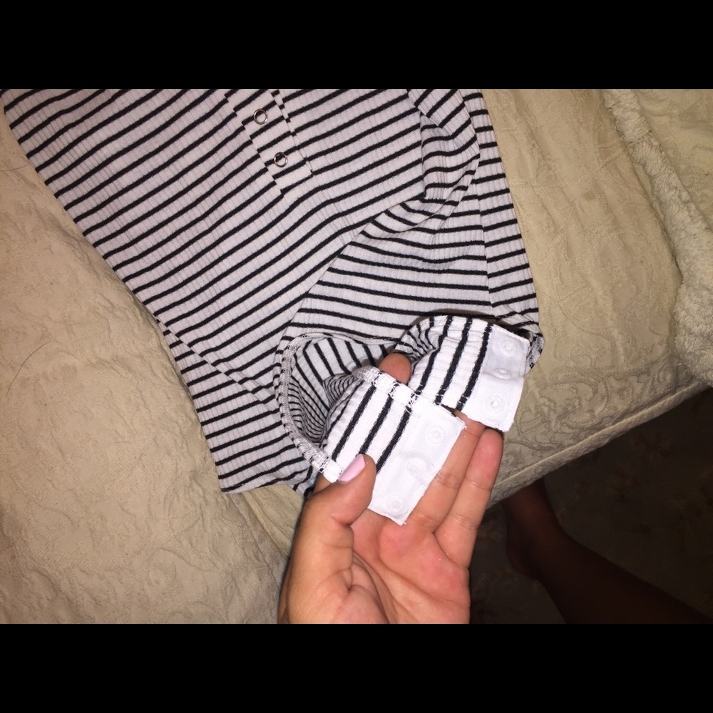 Black and white striped body suit